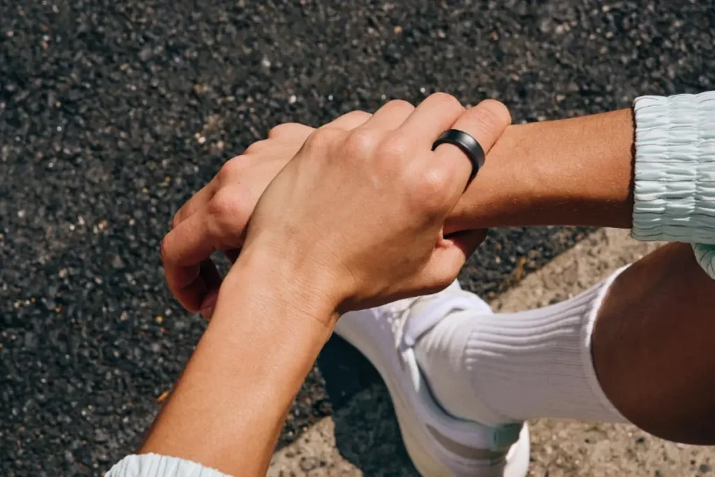 Photo of man wearing Samsung Galaxy ring with sports gear.